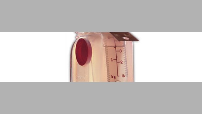 Dosificador de pienso con escala de ajuste en kg y lb.