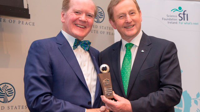 Taoiseach Enda Kenny (right) presents The Science Foundation Ireland St. Patrick's Day Science Medal 2017 to Dr. Pearse Lyons, president of Alltech, at the United States Institute of Peace. Photographed by Nick Crettier.