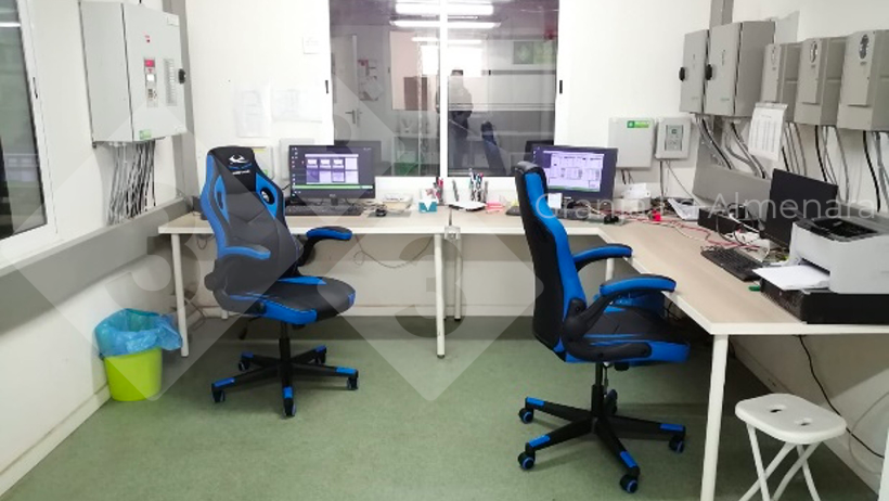 Photo 11: More screens and less paper in an office that transforms data into information.