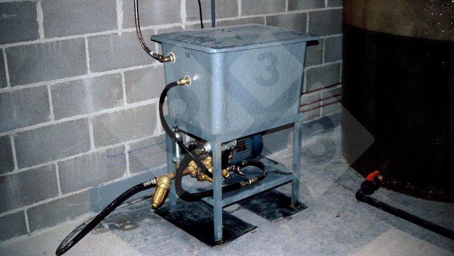 Figure 1. Tank appropriate for medicating in a warehouse with a pressure pump.
