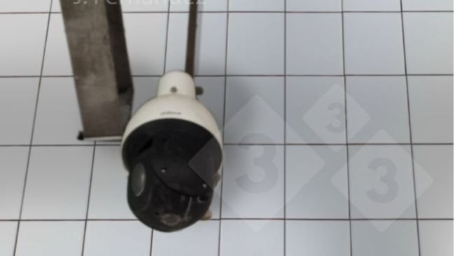 A camera that is part of the video surveillance system installed in a slaughterhouse.