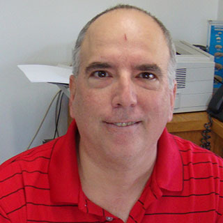 Mark J.  Estienne