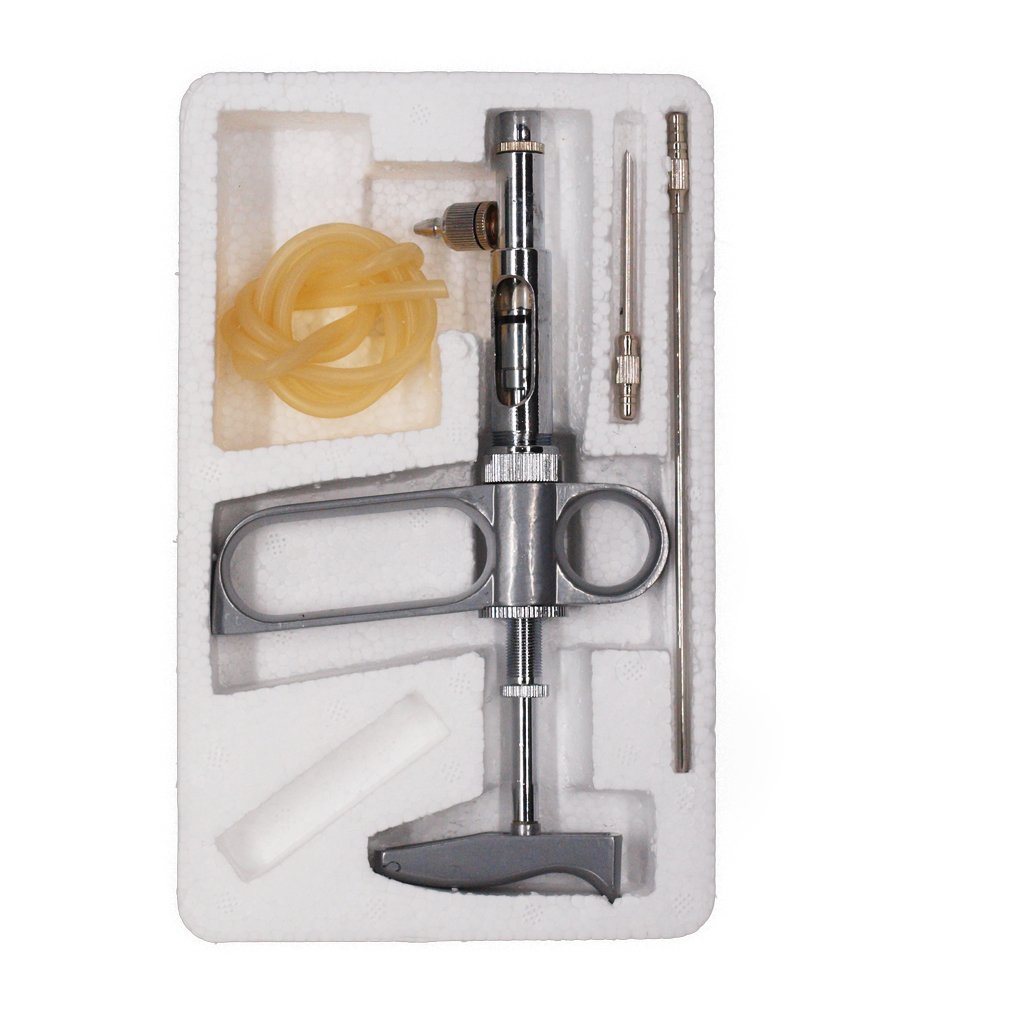 Jeringa vacunadora metálica de 2ml con tubo y aguja Jeringa vacunadora metálica de 2ml con tubo y aguja